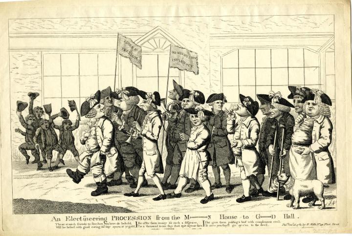 A cartoon satirical drawing of a procession. A group of men are marching in the foreground with banners and instruments, all adorned with tricorn hats, wigs and long smart coats and black buckled shoes. To the left of them in the background are a group of boys with their hats in their hands shouting at the procession.  The picture is titled at the bottom 'An Electioneering Procession from the M-N [Mansion] House to G-D [Guild] Hall'. 