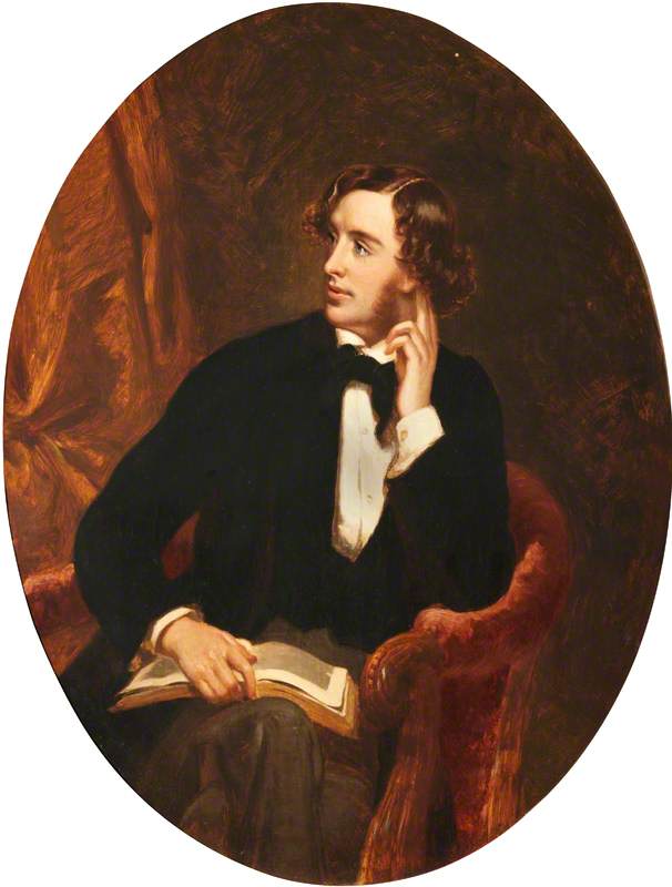 Oil painting showing a man with curly brown hair and mutton chop whiskers, wearing a black jacket and waistcoat, white shirt, black bow tie and brown trousers. He is sitting on a red chair with a book in his lap.